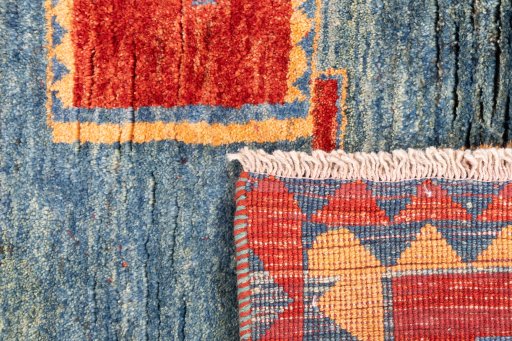 Close-up detail of 1975s Persian Gabbeh rug from Iran / Persia showing Wool weave