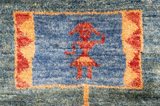 Full view of 1975s Persian Gabbeh rug from Iran / Persia, 207 × 175 cm in Blue tones
