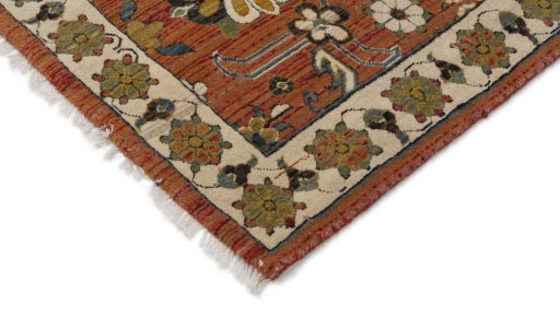 Backside of handmade New Persian Gabbeh rug showing knot structure and weave density