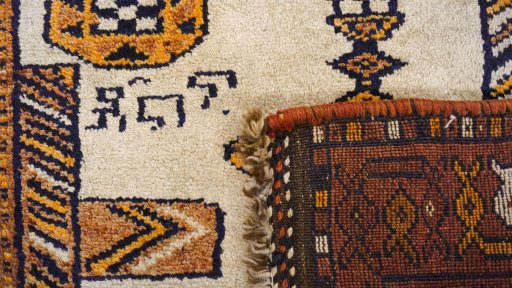 Full view of 2000s Persian Gabbeh rug from Iran / Persia, 375 × 147 cm in Beige tones
