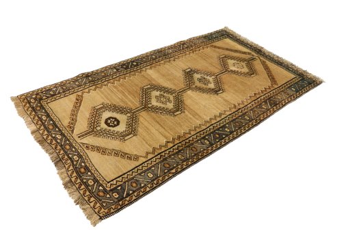 Corner detail of 1990s Persian Gabbeh rug showing border pattern and Wool pile