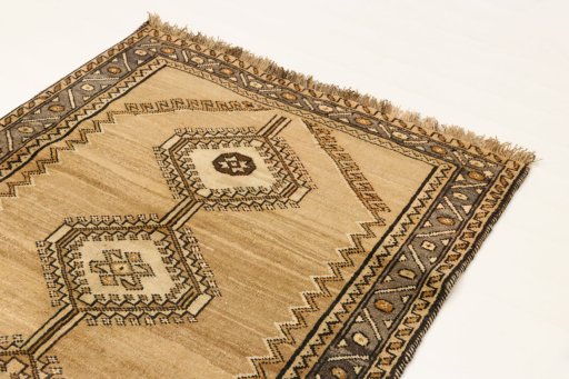 Surface texture of 1990s Persian Gabbeh rug with natural Wool and intricate pattern