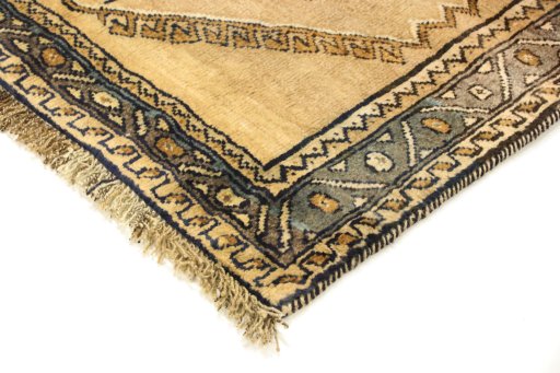 Backside of handmade 1990s Persian Gabbeh rug showing knot structure and weave density