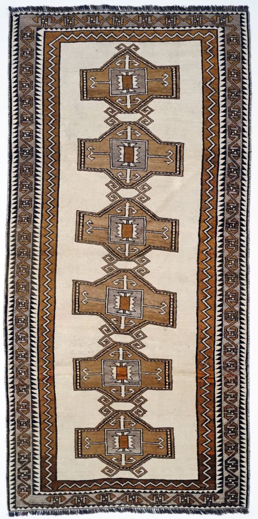 Full view of 2000s Persian Gabbeh rug from Iran / Persia, 225 × 105 cm in Beige tones