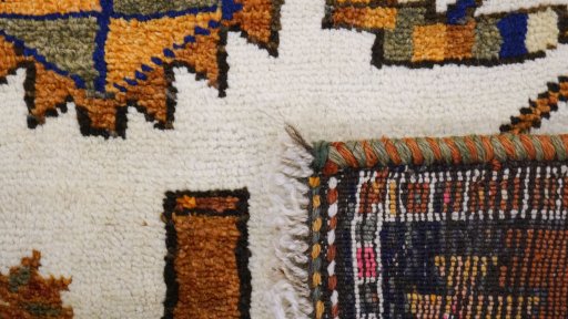 Full view of 1920s Persian Gabbeh rug from Iran / Persia, 367 × 144 cm in Beige tones