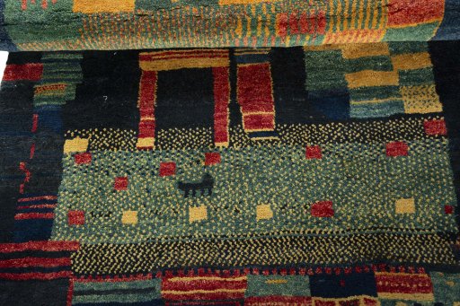 Full view of 2000s Persian Gabbeh rug from Pakistan, 185 × 115 cm in Multi Color tones