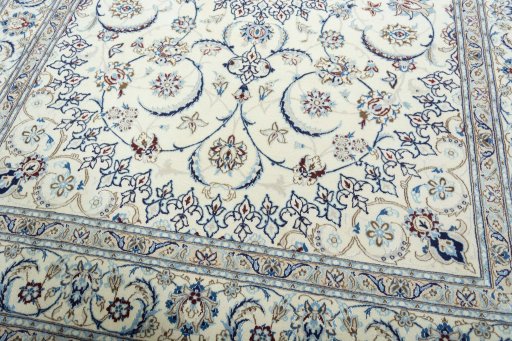Close-up detail of 2000s Nain rug from Iran / Persia showing Wool weave