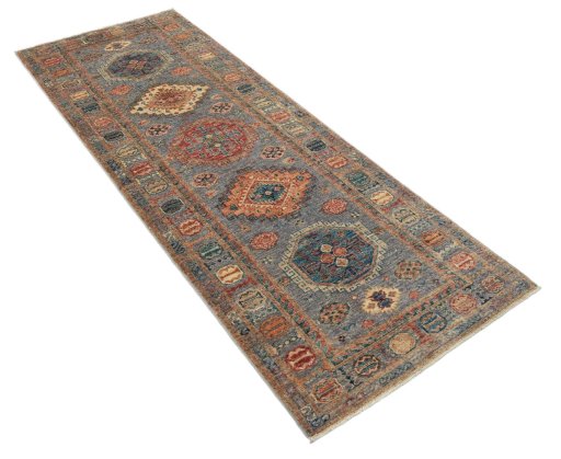 Corner detail of New Kazak rug showing border pattern and Wool pile