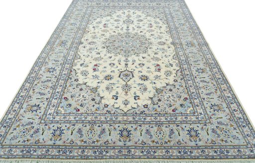 Surface texture of 2000s Kashan rug with natural Wool and intricate pattern