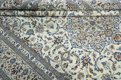 Close-up detail of 2000s Kashan rug from Iran / Persia showing Wool weave