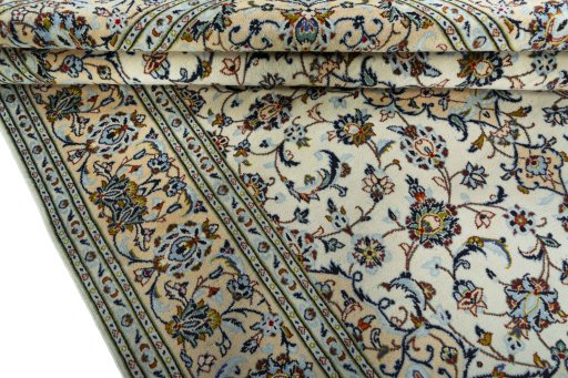 Close-up detail of 2000s Kashan rug from Iran / Persia showing Wool weave