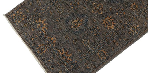 Backside of handmade New Farahan rug showing knot structure and weave density