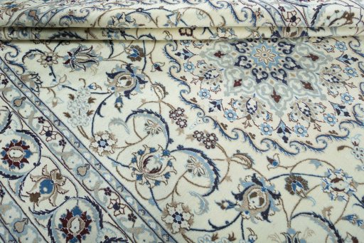 Close-up detail of 2000s Nain rug from Iran / Persia showing Wool weave