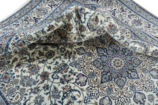 Surface texture of New Nain rug with natural Wool and intricate pattern