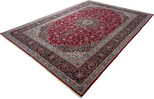 Corner detail of 2000s Kashan rug showing border pattern and Wool pile