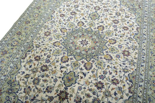 Backside of handmade 2000s Kashan rug showing knot structure and weave density
