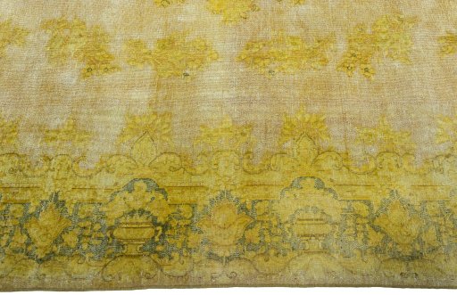 Corner detail of 1950s Vintage rug showing border pattern and Wool pile