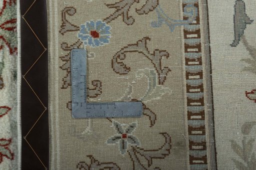 Backside of handmade New Kashmar rug showing knot structure and weave density