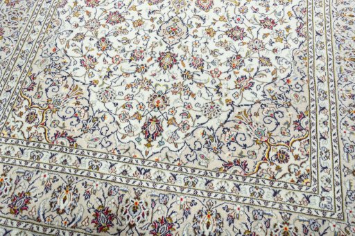 Close-up detail of 2000s Kashan rug from Iran / Persia showing Wool weave