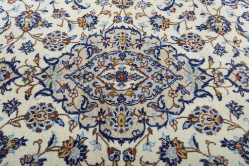Central medallion detail of 2000s Kashan rug from Iran / Persia