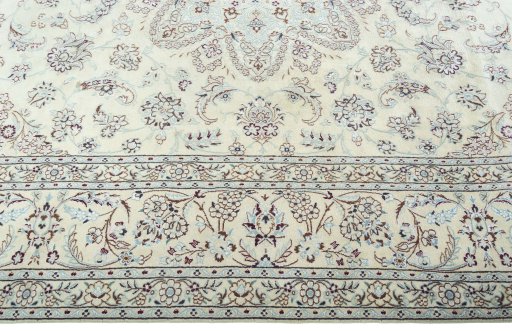 Corner detail of 2000s Nain rug showing border pattern and Wool pile