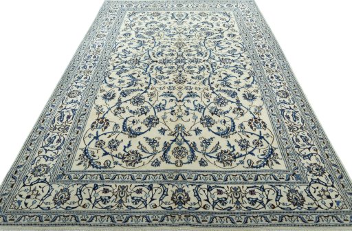 Surface texture of 2000s Nain rug with natural Wool and intricate pattern
