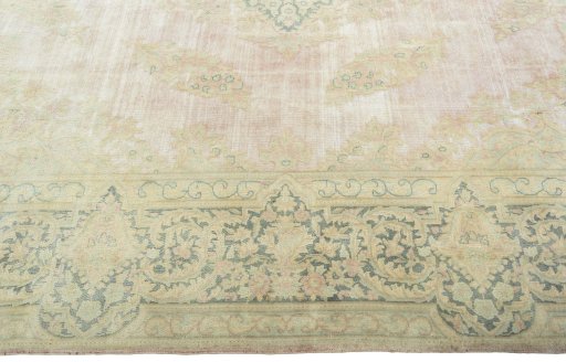 Corner detail of 1950s Vintage rug showing border pattern and Wool pile