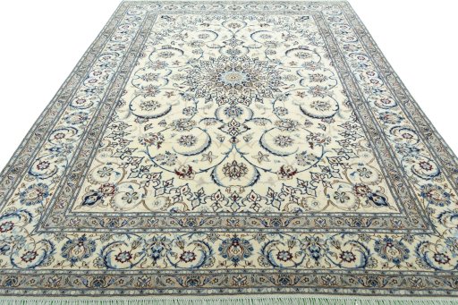 Surface texture of 2000s Nain rug with natural Wool and intricate pattern