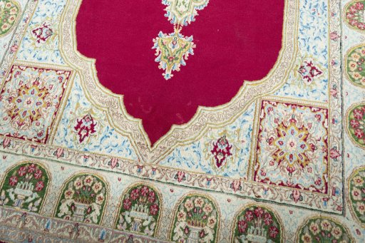 Close-up detail of 1970s Kerman rug from Iran / Persia showing Wool weave
