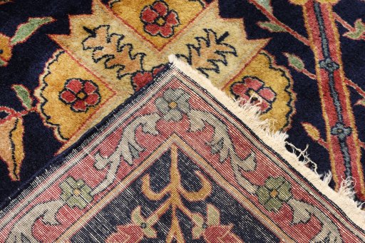 Close-up detail of 1920s Agra rug from India showing Wool weave