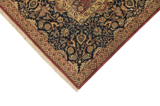 Backside of handmade New Agra rug showing knot structure and weave density