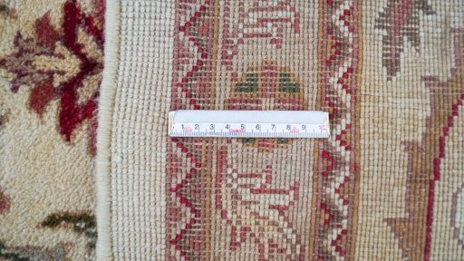 Full view of 1990s Jaipur rug from India, 567 × 359 cm in Cream tones