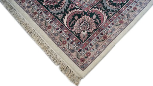 Backside of handmade 1990s Jaipur rug showing knot structure and weave density