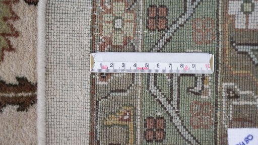 Corner detail of 1990s Jaipur rug showing border pattern and Wool pile