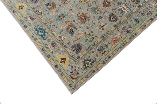 Backside of handmade New Farahan rug showing knot structure and weave density