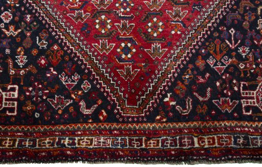 Close-up detail of 2000s Shiraz rug from Iran / Persia showing Wool weave