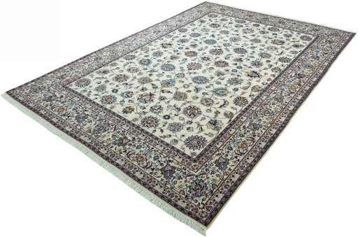 Corner detail of 2000s Mashad rug showing border pattern and Wool pile