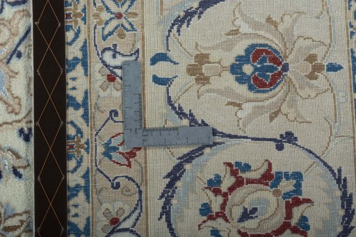 Backside of handmade 2000s Nain rug showing knot structure and weave density