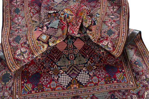 Surface texture of 2000s Kashan rug with natural Wool and intricate pattern