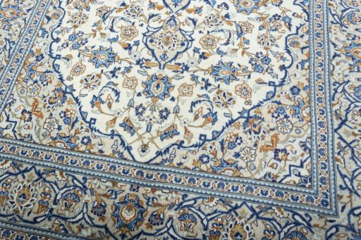 Close-up detail of 2000s Kashan rug from Iran / Persia showing Wool weave