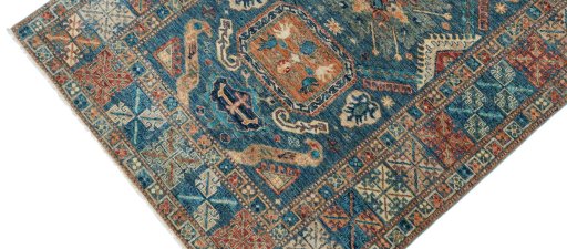 Backside of handmade New Kazak rug showing knot structure and weave density
