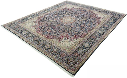 Corner detail of 1970s Kerman rug showing border pattern and Wool pile