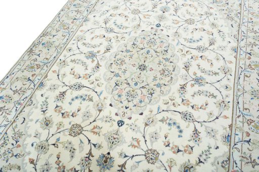 Backside of handmade New Kashan rug showing knot structure and weave density