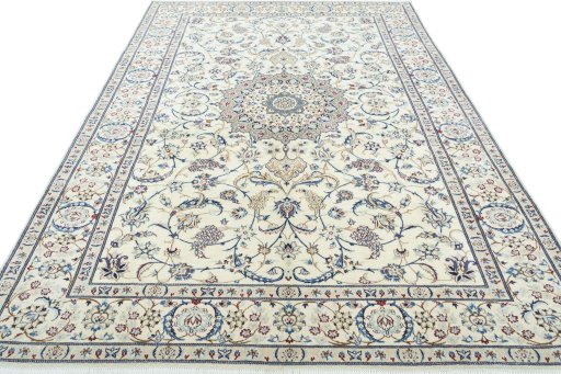 Surface texture of 2000s Nain rug with natural Wool and intricate pattern