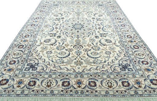 Surface texture of 2000s Nain rug with natural Wool and intricate pattern
