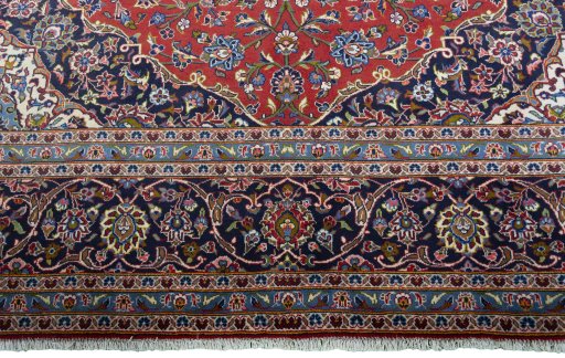 Full view of New Kashan rug from Iran / Persia, 412 × 300 cm in Red tones