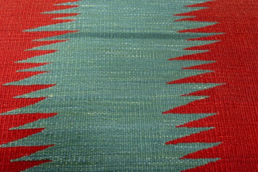 Backside of handmade New Kilim Sofre rug showing knot structure and weave density