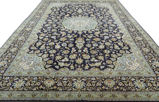 Surface texture of 2000s Kashan rug with natural Wool and intricate pattern