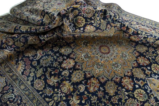 Surface texture of 2000s Kashan rug with natural Wool and intricate pattern
