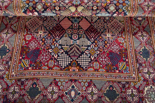 Close-up detail of 2000s Kashan rug from Iran / Persia showing Wool weave